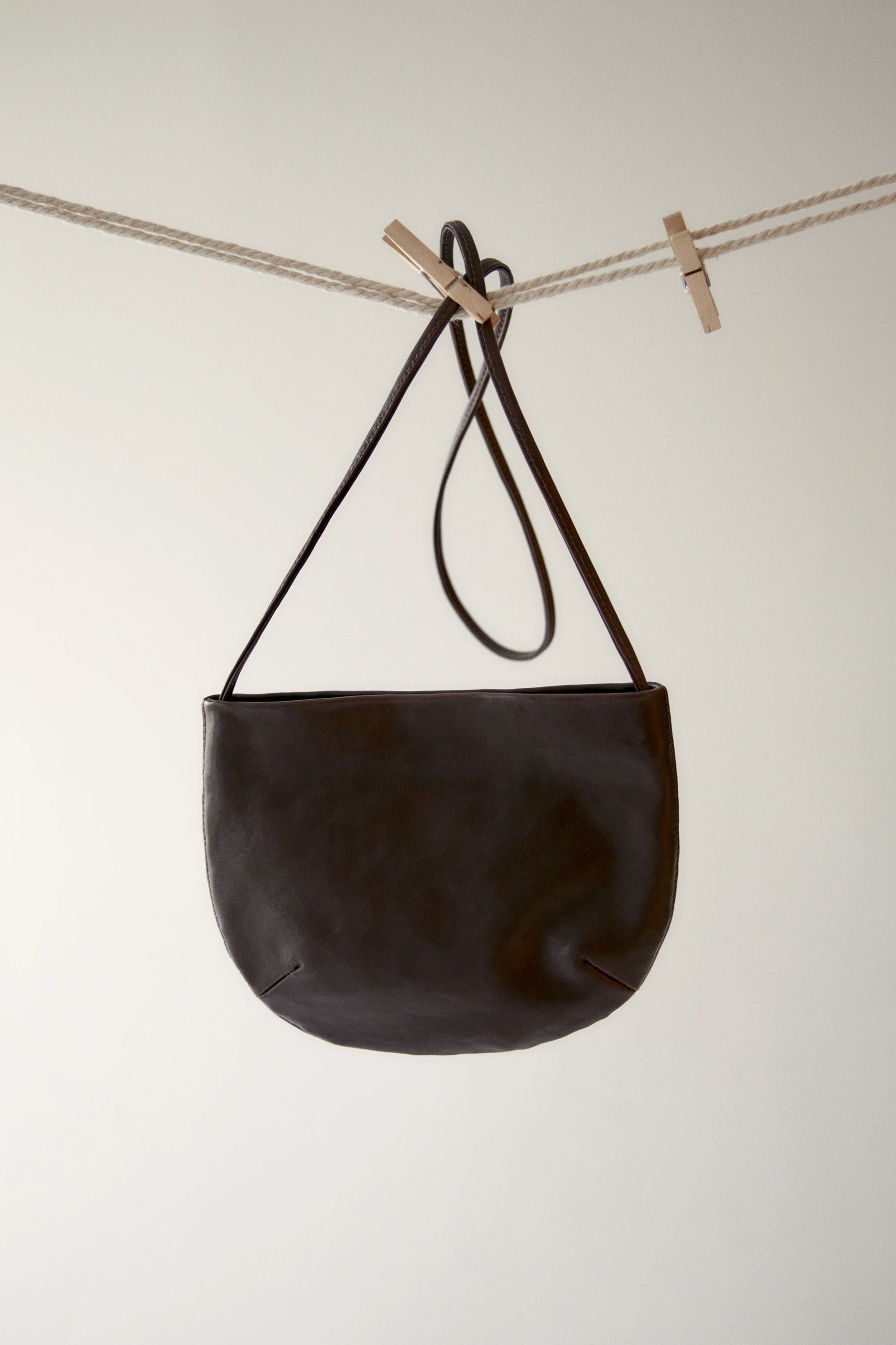 Calfskin Half Moon Crossbody Bag - Image 9