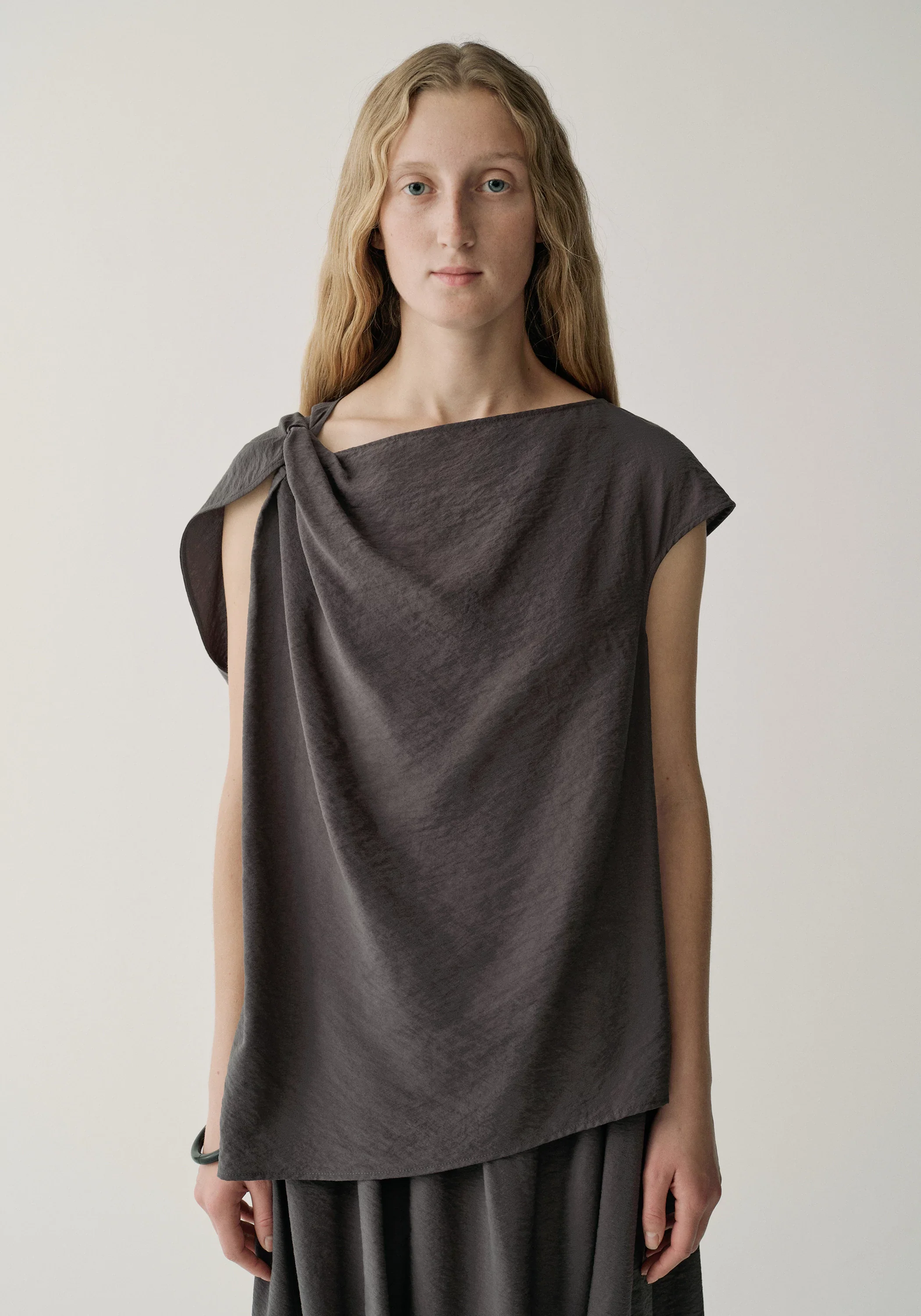 Twist-knot Top